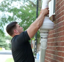 Technician testing for radon